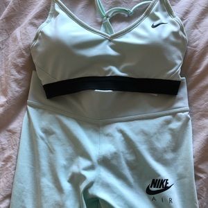 Light blue Nike leggings and sports bra